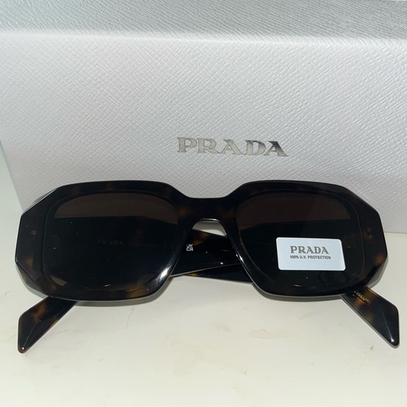 BRAND NEW PRADA IN SHADE TORTOISE. Never been worn only unboxed.